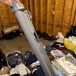 Retractable baby gate